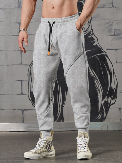 Men’s Motion Sweatpants Loose Fit Tapered Joggers for Gym & Running
